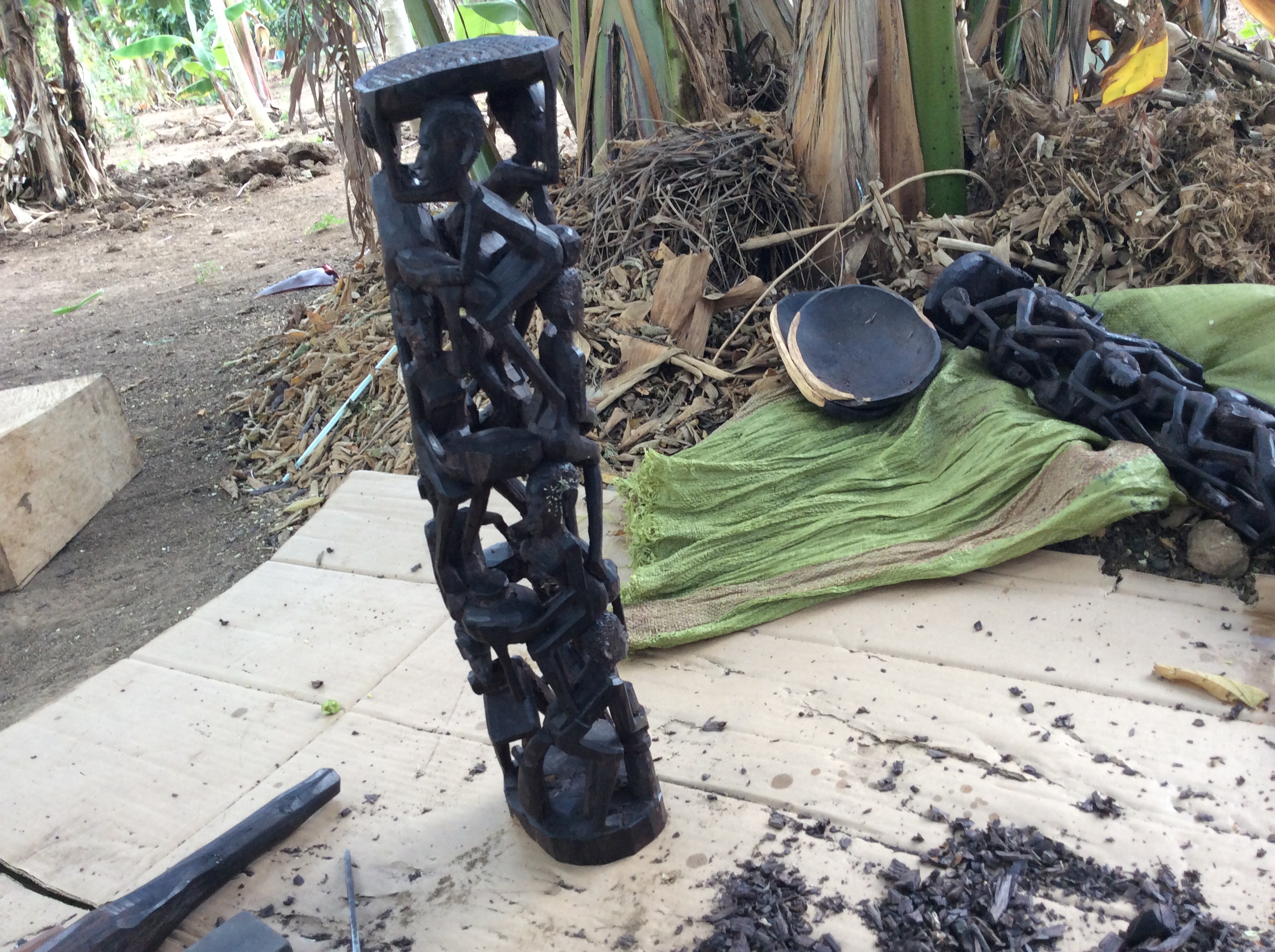 Wood carving with Mzee Pius